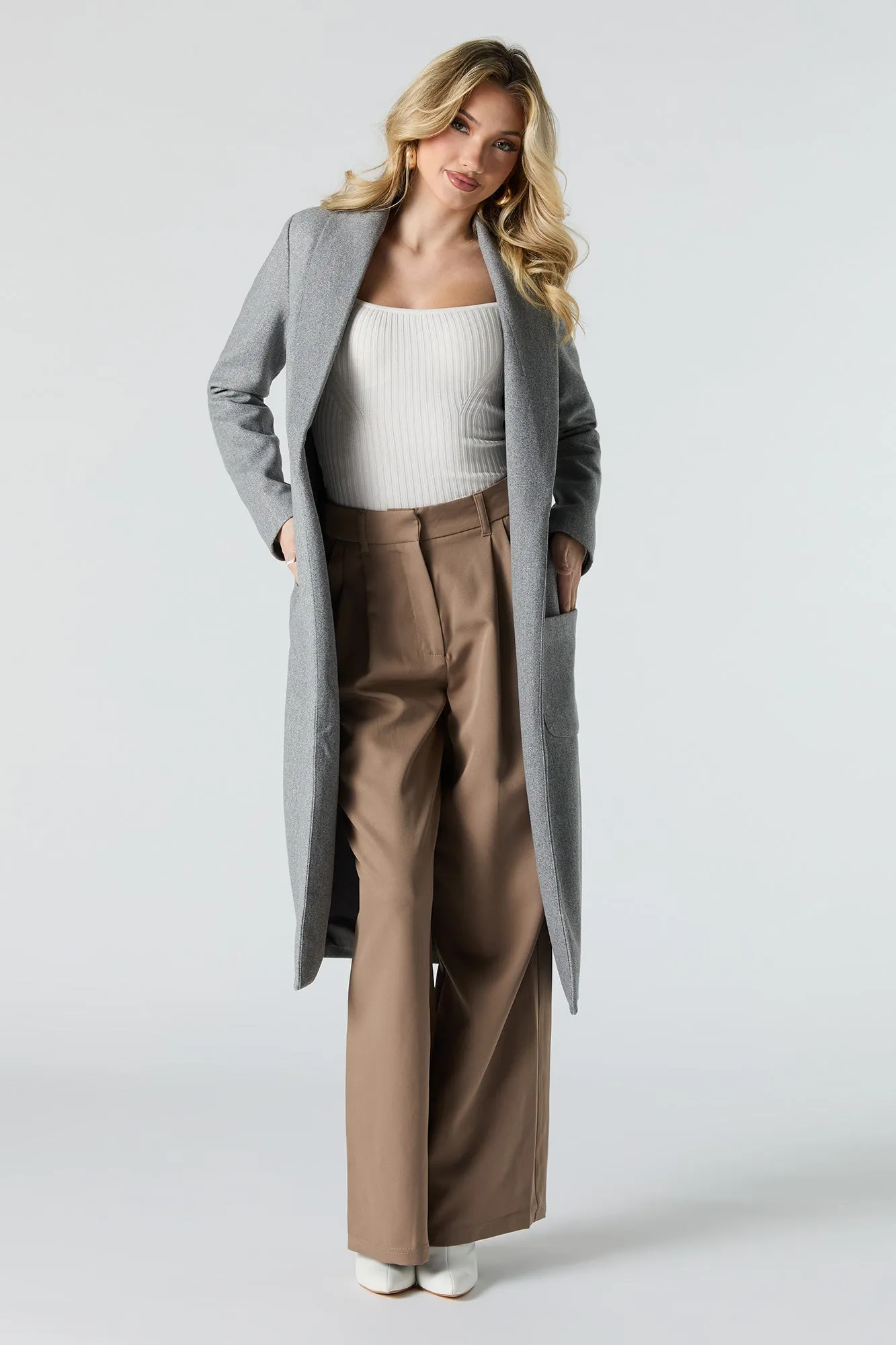 Manteau long ouvert en laine sold by Urban Planet