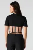 T-shirt corset en filet diaphane sold by Urban Planet
