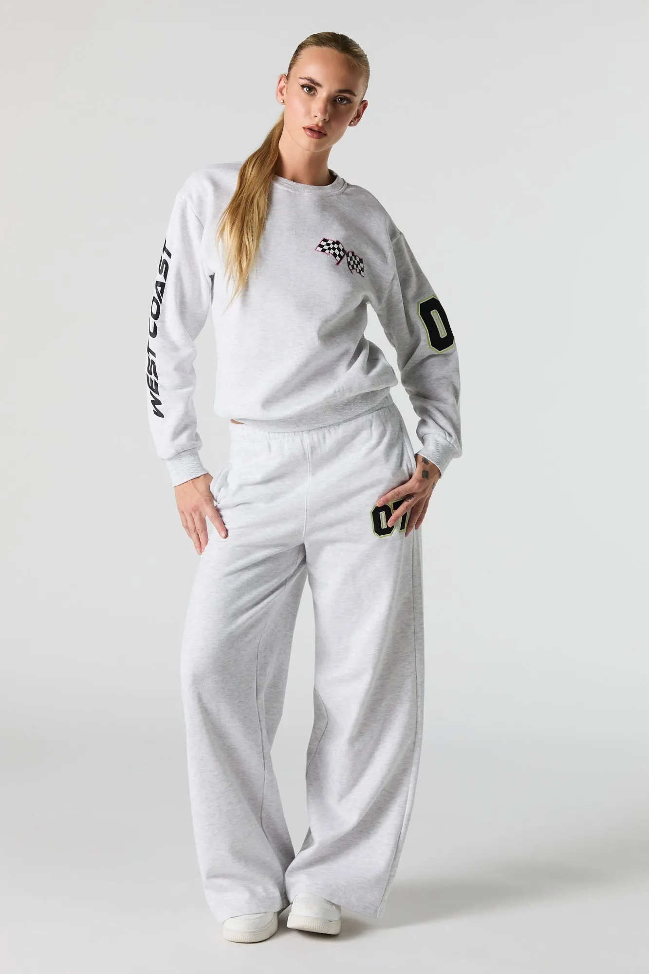 07 Racer Embroidered Fleece Wide Leg Sweatpant sold by Urban Planet