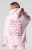 Haut à capuchon en molleton à broderie en chenille Barbie™ sold by Urban Planet