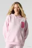 Haut à capuchon en molleton à broderie en chenille Barbie™ sold by Urban Planet