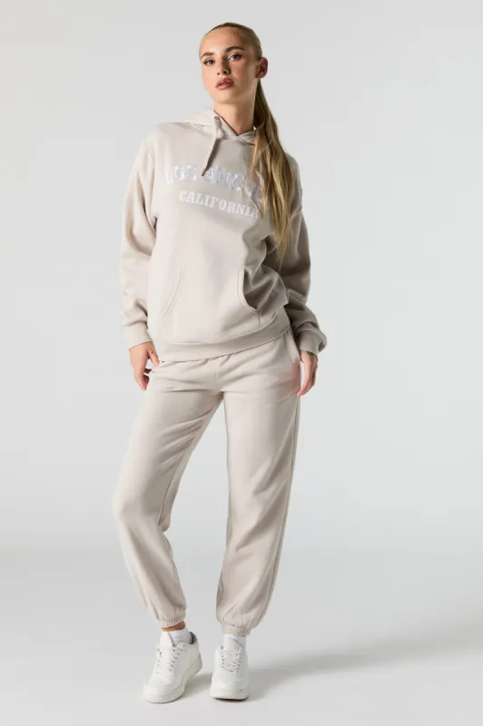 Jogger en molleton avec motif brodé City sold by Urban Planet