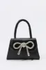 Rhinestone Bow Mini Purse sold by Urban Planet