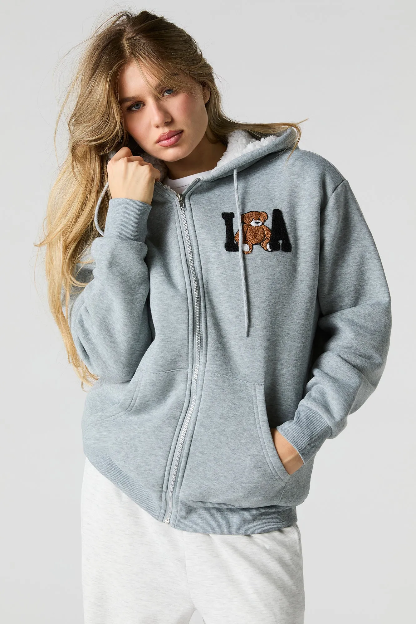 Chenille Embroidered Faux Fur Lined Fleece Hoodie sold by Urban Planet