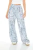 Jean en denim à imprimé effet d'usure sold by Urban Planet