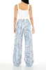 Jean en denim à imprimé effet d'usure sold by Urban Planet