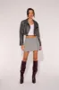 Pleated Mock Wrap Mini Skirt sold by Urban Planet