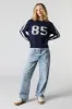 Striped Sleeve Jacquard Knit Sweater sold by Urban Planet