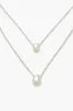 Collier superposé avec breloque ronde sold by Urban Planet