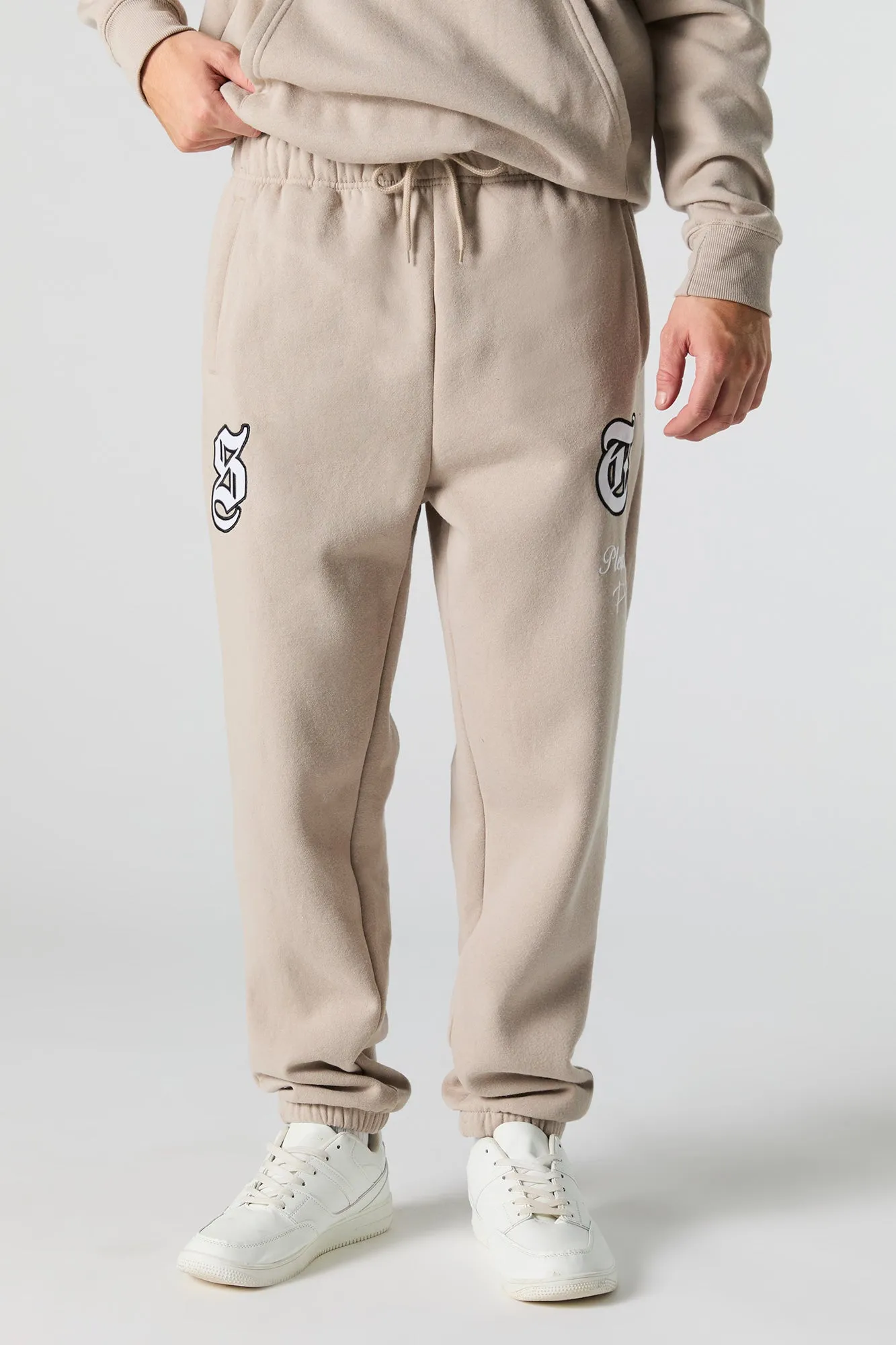 Pleasure & Pain Embroidered Fleece Jogger sold by Urban Planet