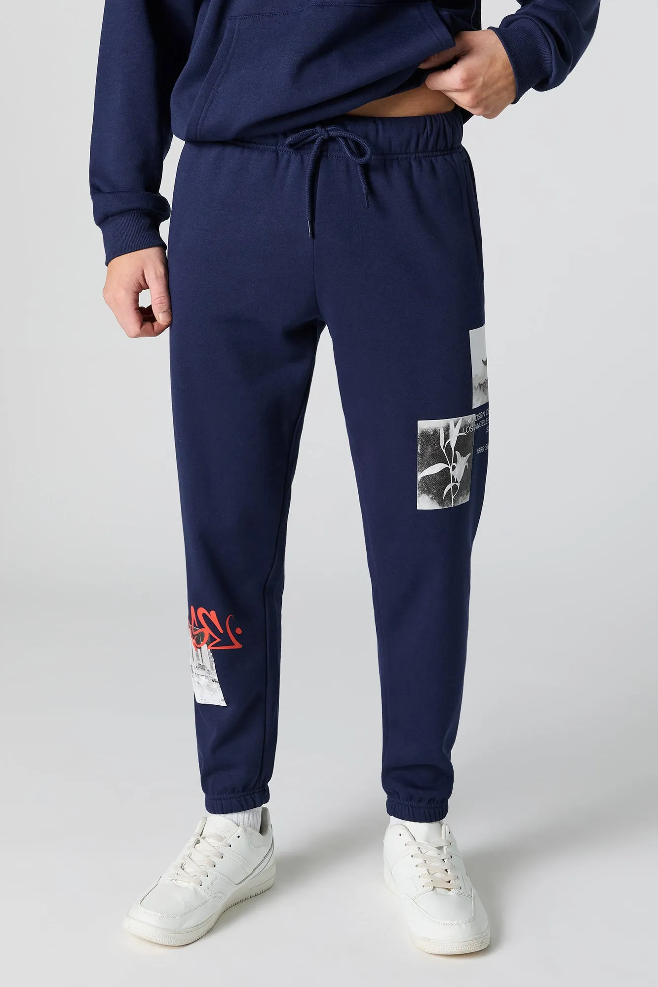 A Graffiti Graphic Fleece Jogger sold by Urban Planet