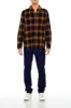 Plaid Flannel Curved Hem Top sold by Urban Planet