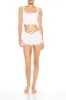 Ensemble avec camisole corset à rosettes et short sold by Urban Planet