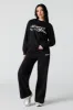 Pantalon d'entraînement à jambe large en molleton à imprimé sold by Urban Planet