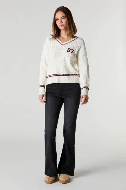 Jean extensible à jambe évasée délavé noir sold by Urban Planet