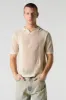 Polo crocheté sold by Urban Planet