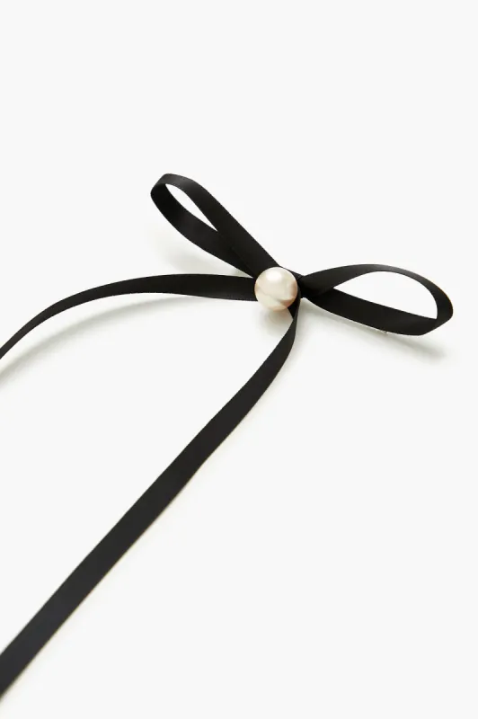 Faux Pearl Bow Hair Clip Set (4 Pcs) sold by Urban Planet