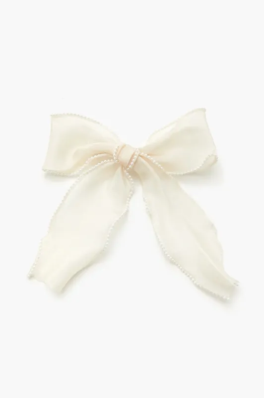 Faux Pearl Bow Hair Barrette sold by Urban Planet