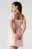 Minirobe smockée à manches bouffantes sold by Urban Planet