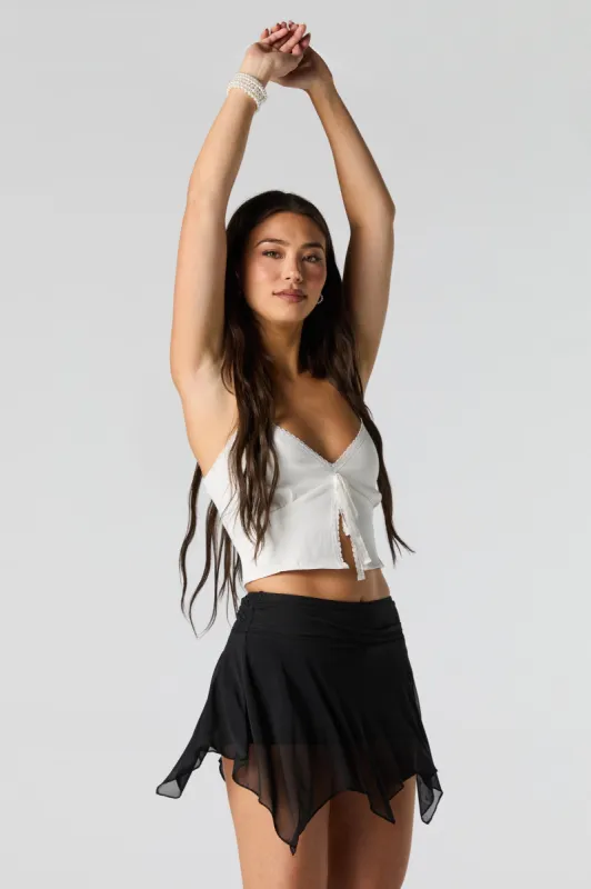 Minijupe-short asymétrique en filet sold by Urban Planet