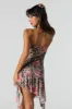 Minirobe asymétrique volantée en filet sold by Urban Planet