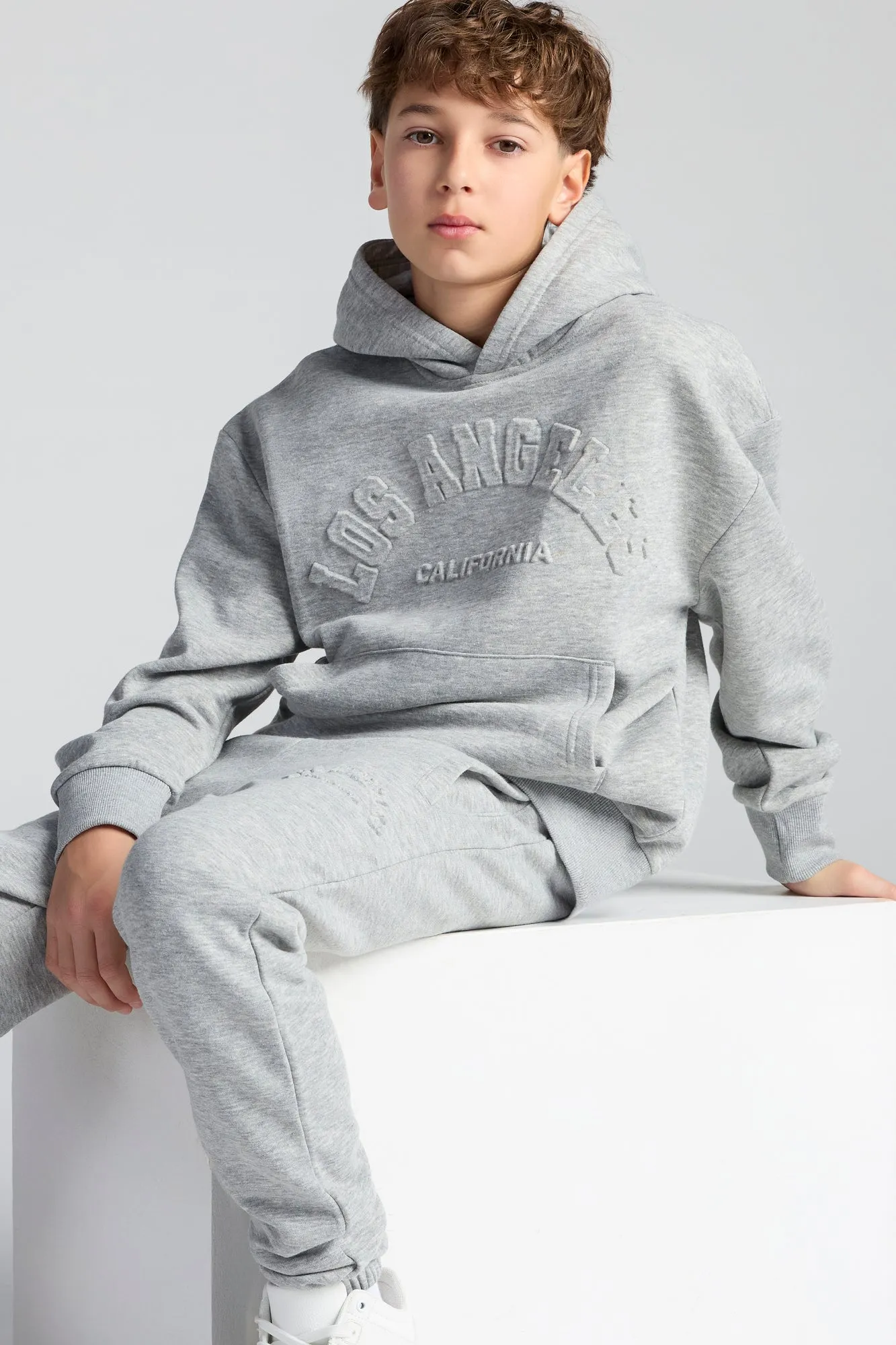 Boys City Embossed Fleece Jogger sold by Urban Planet