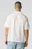Textured Short Sleeve Button-Up Top sold by Urban Planet