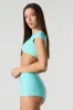 Ultra Cropped Short Sleeve Swim Top sold by Urban Planet