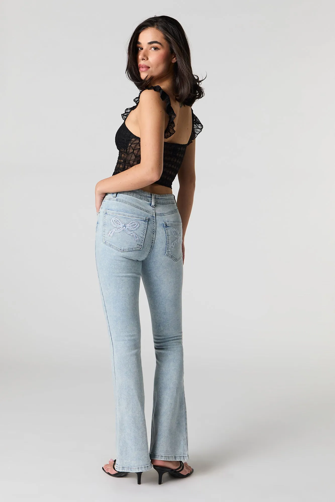 Light Wash Mid Rise Embroidered Back Pocket Flare Jean sold by Urban Planet product image thumbnail 4