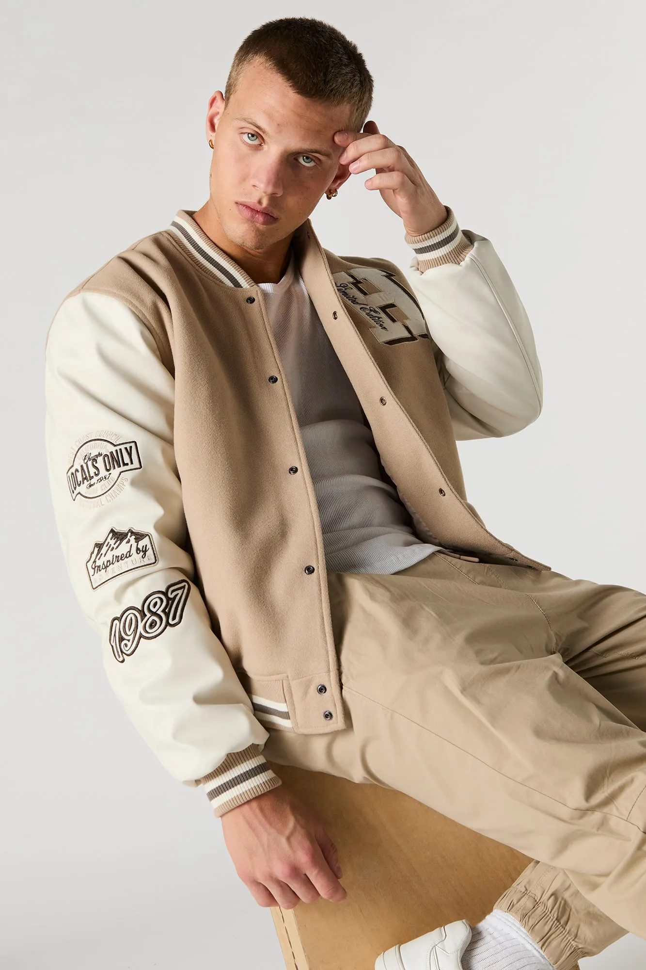 Embroidered Faux-Leather & Fleece Varsity Jacket sold by Urban Planet