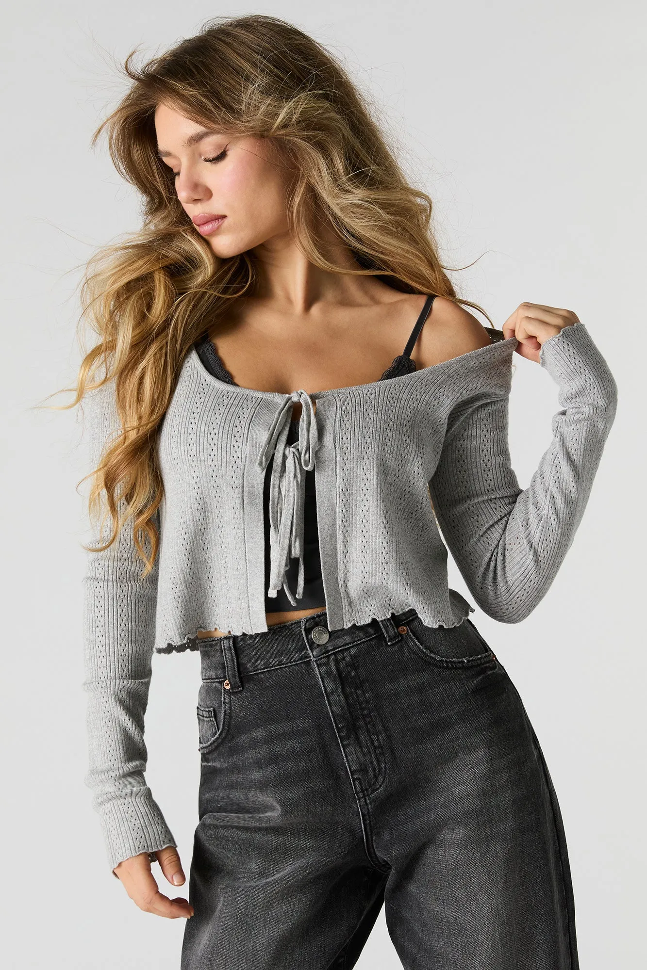 Cardigan en tricot pointelle avec attache à l'avant sold by Urban Planet