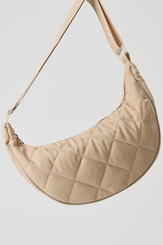 Sac à l'épaule en nylon matelassé en forme de demi-lune sold by Urban Planet
