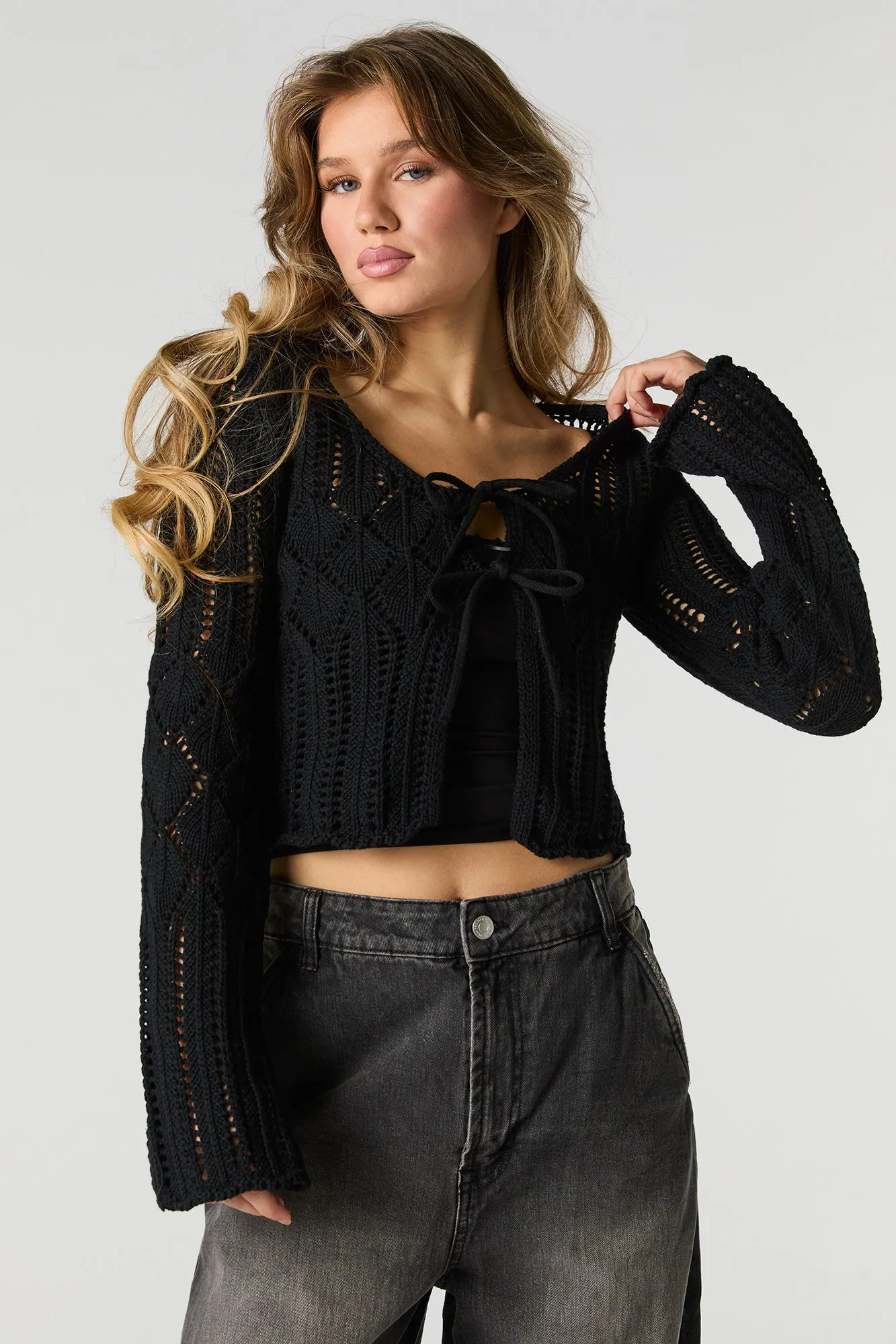 Open Knit Tie Front Flyaway Sweater sold by Urban Planet