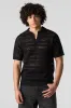 Polo en tricot ajouré à manches courtes sold by Urban Planet