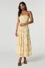 Jupe maxi smockée fleurie sold by Urban Planet