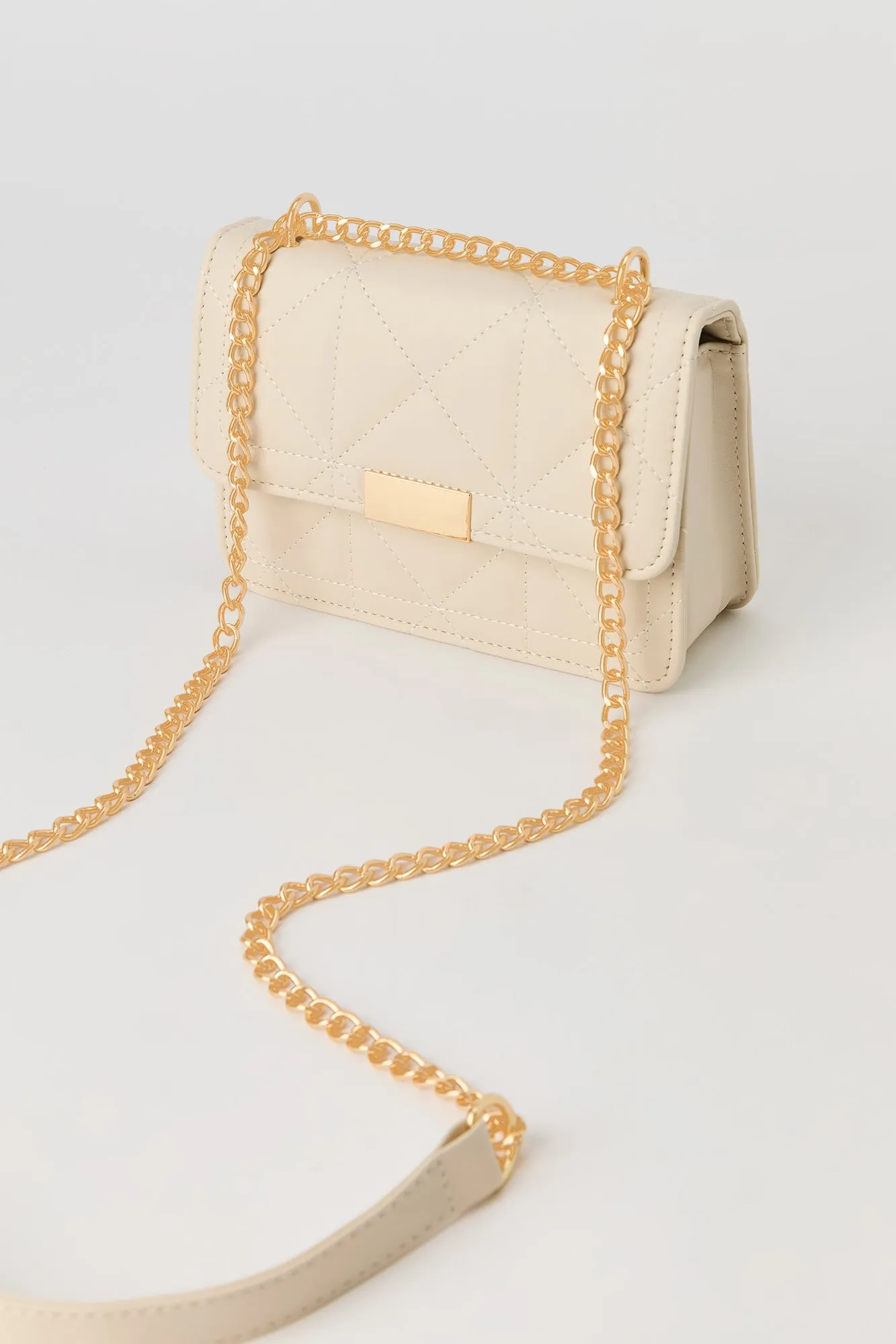 Faux Leather Quilted Crossbody Purse sold by Urban Planet