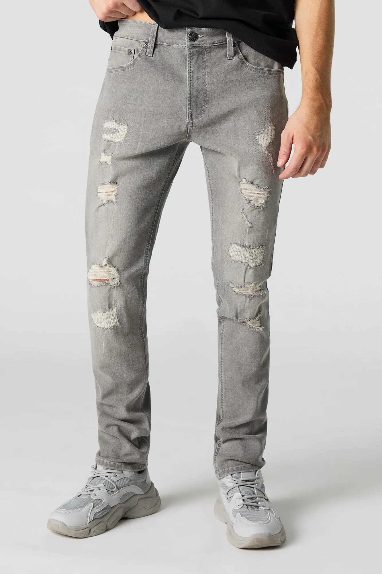 Jean ajusté d'aspect usé délavé gris sold by Urban Planet