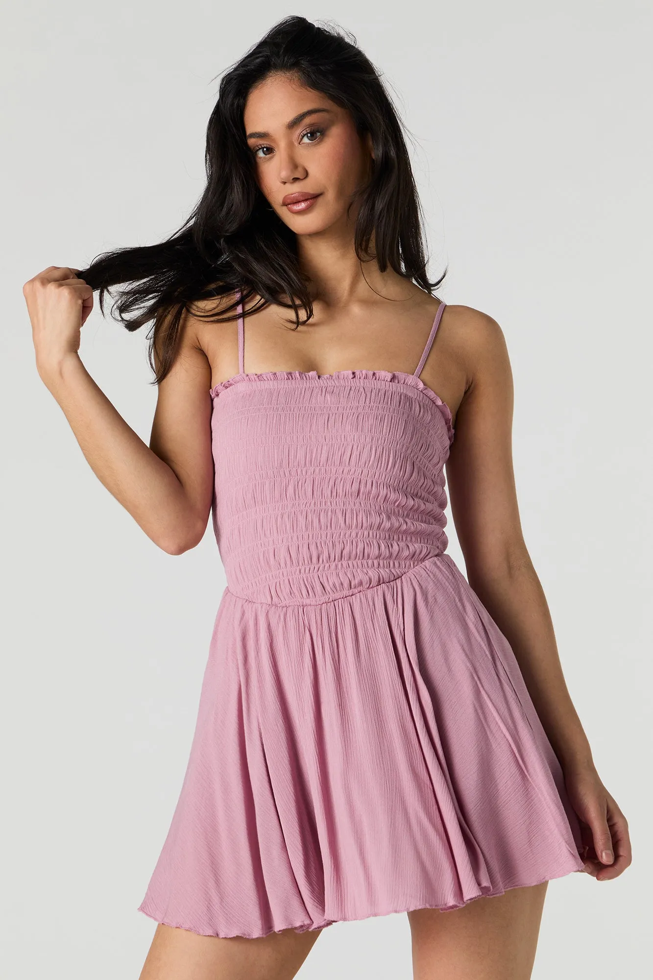 Smocked Mini Romper sold by Urban Planet