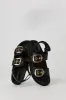 Sandales en similicuir avec boucles sold by Urban Planet