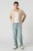 Haut boutonné texturé avec col sold by Urban Planet