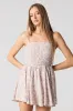 Smocked Dipped Waist Mini Romper sold by Urban Planet