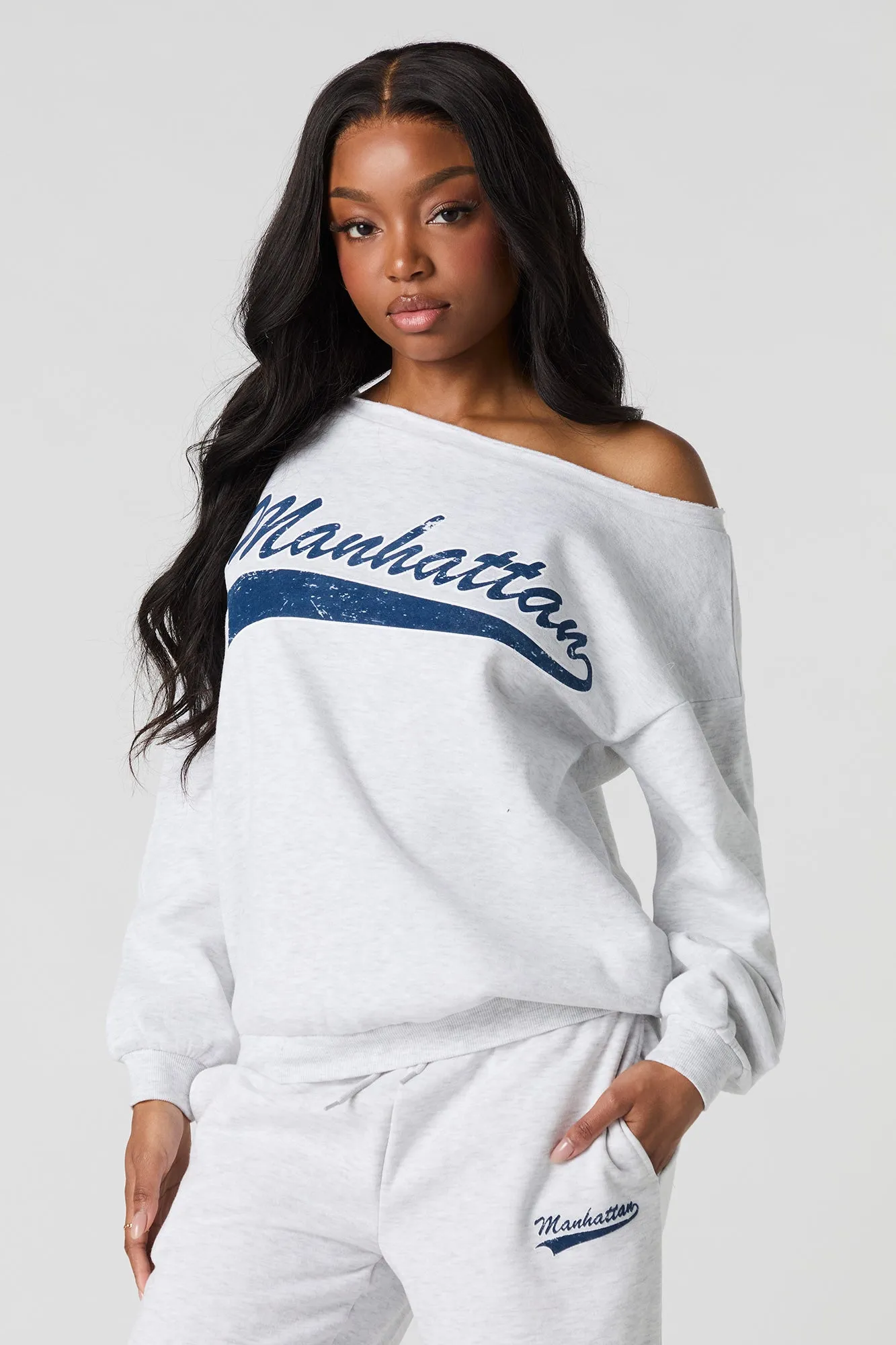 Manhattan Graphic Off Shoulder Fleece Sweatshirt sold by Urban Planet