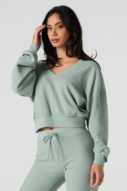 Chandail en molleton en tricot gaufré et col en V sold by Urban Planet