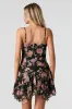 Minirobe asymétrique en chiffon fleuri sold by Urban Planet