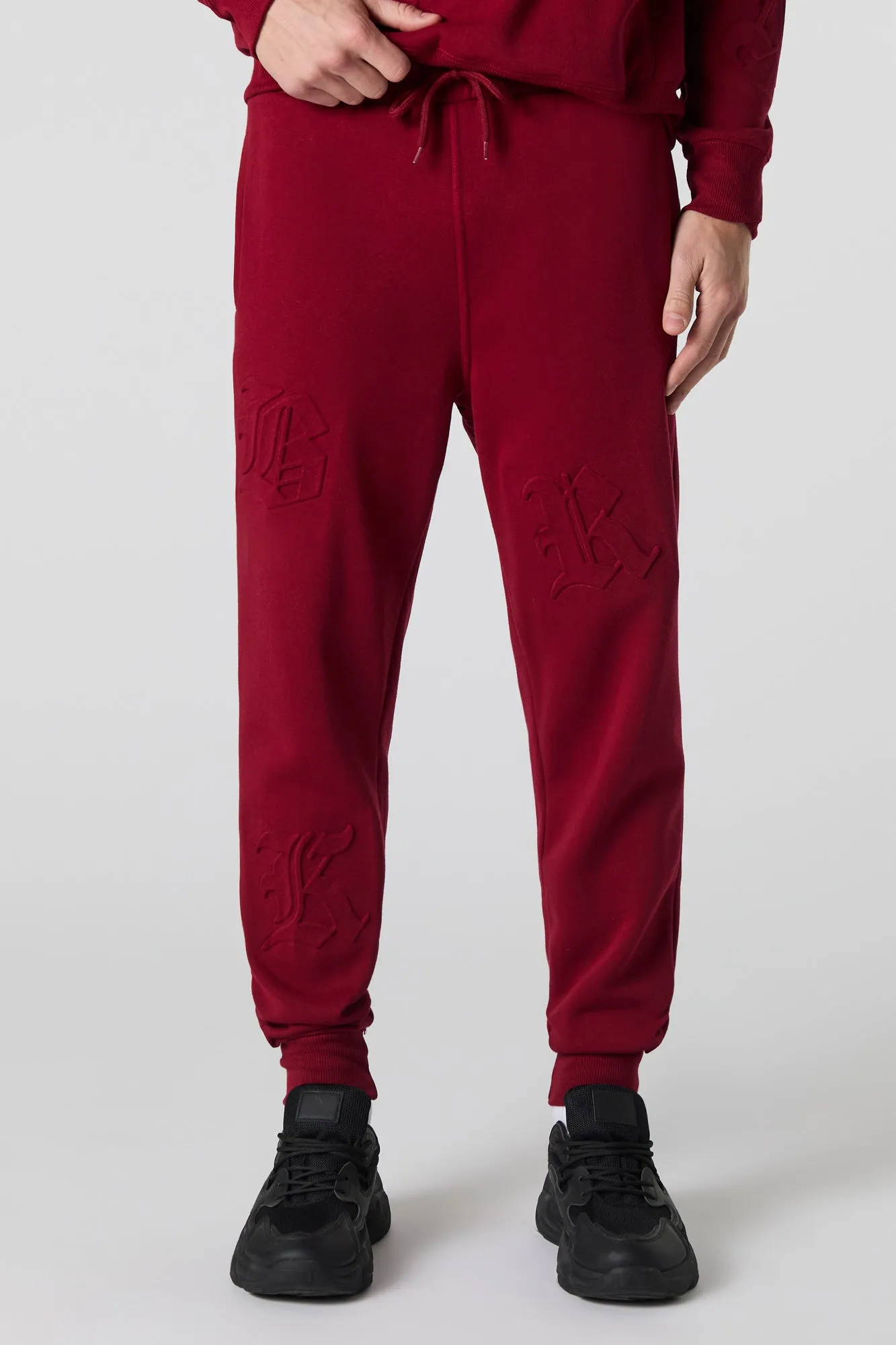 Letter Embossed Fleece Jogger sold by Urban Planet