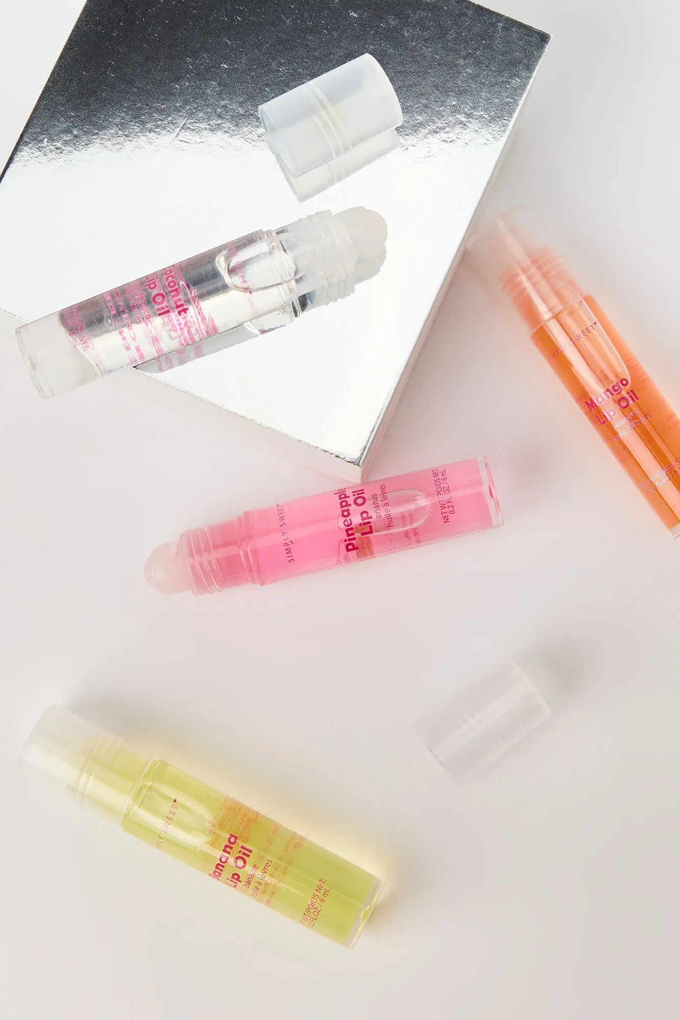 Huile à lèvres aux fruits (paquet de 4) sold by Urban Planet