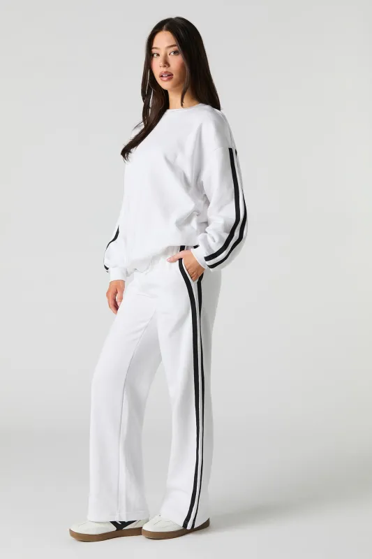 Pantalon d'entraînement en molleton avec rayures latérales sold by Urban Planet