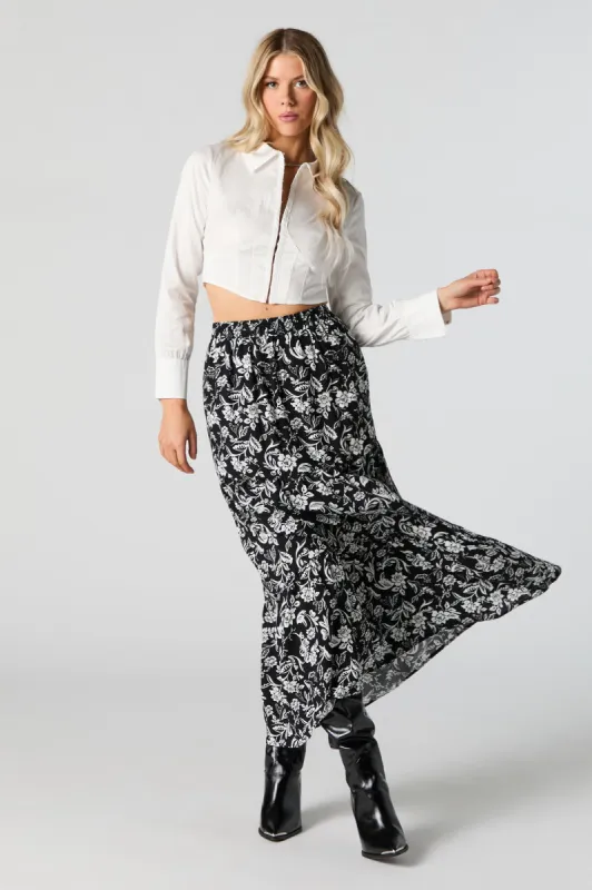 Jupe maxi volantée fleurie noire sold by Urban Planet
