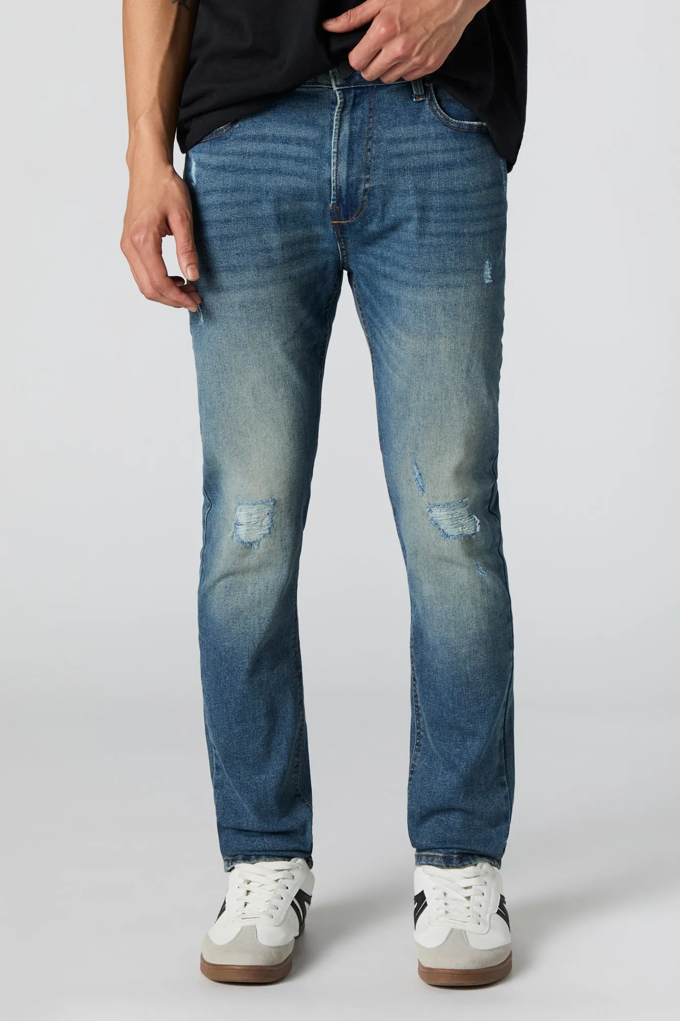 Jean mince extensible à effet d'usure lavé foncé sold by Urban Planet