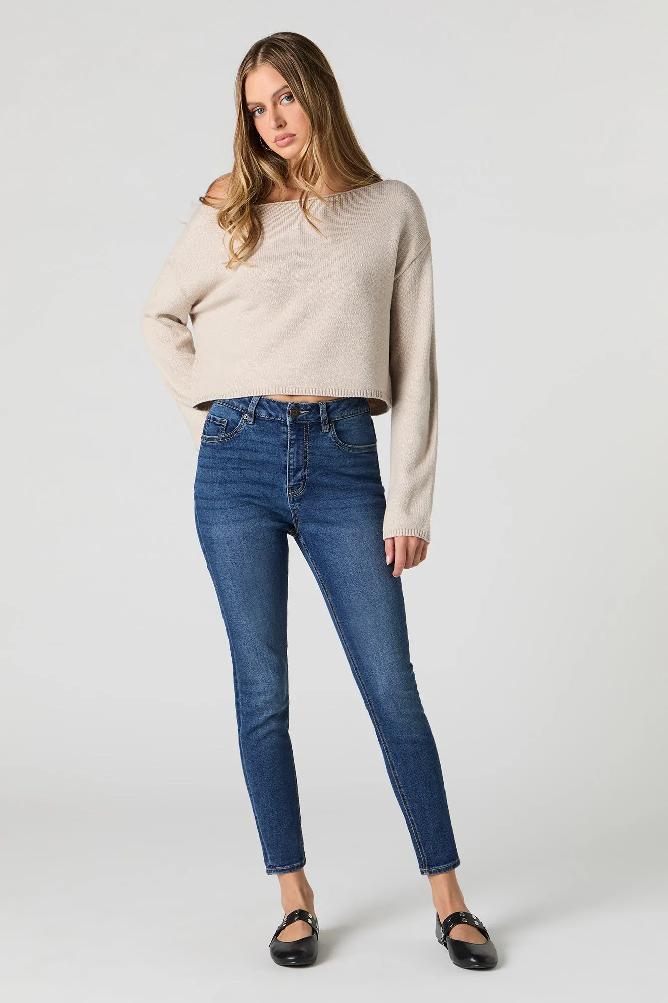 Jean ajusté délavé foncé à taille jaute sold by Urban Planet